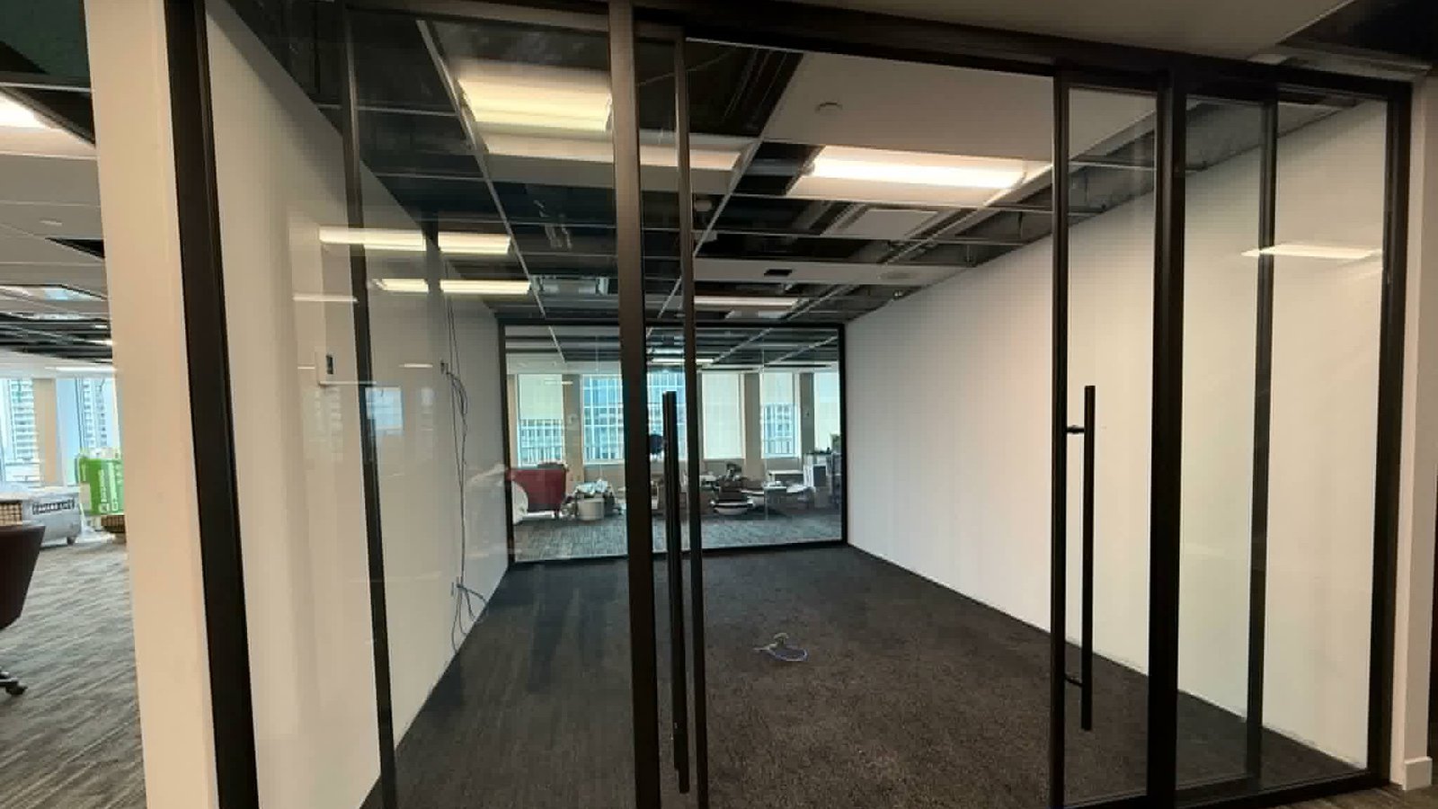 Glass office partitions and walls installed by SOIS in a Toronto office