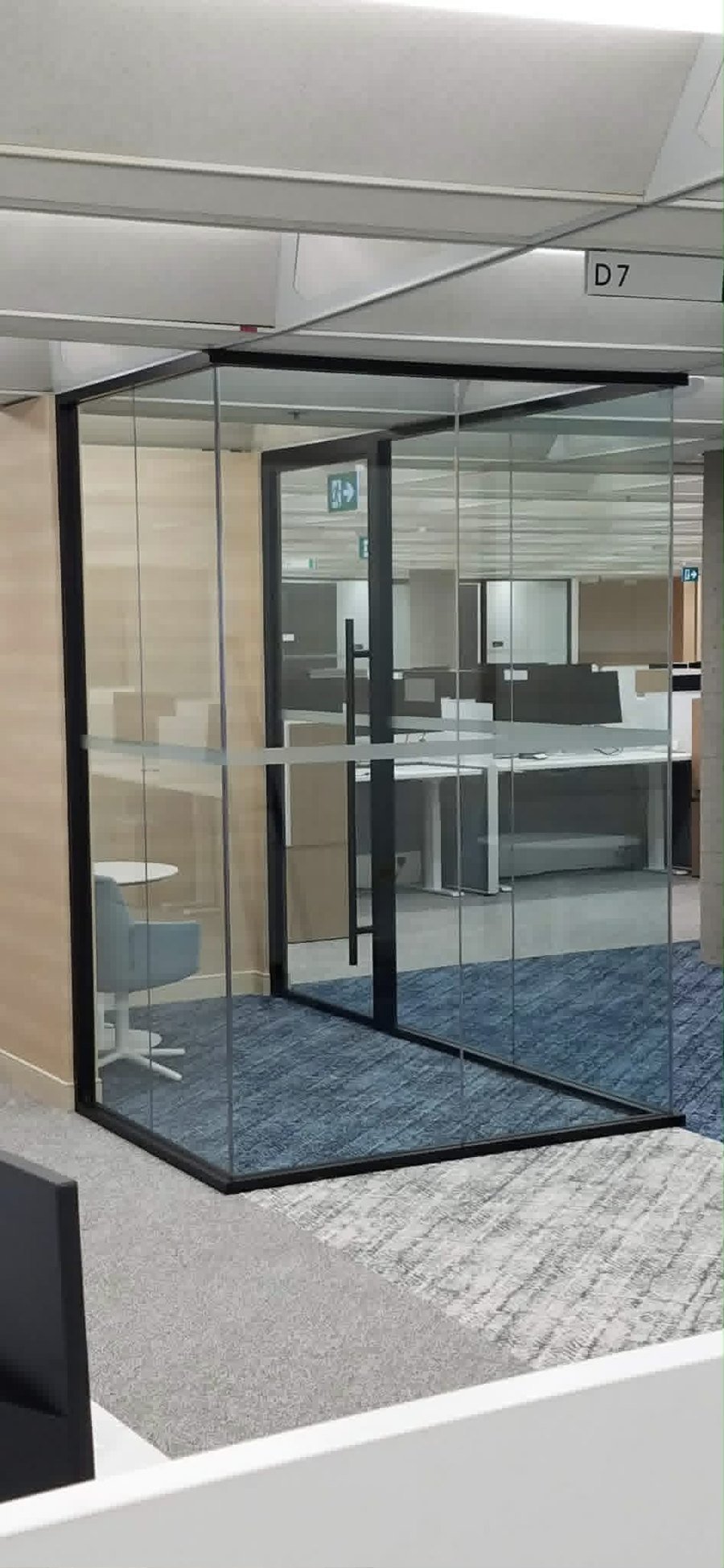 Corner glass office enclosure installed by SOIS