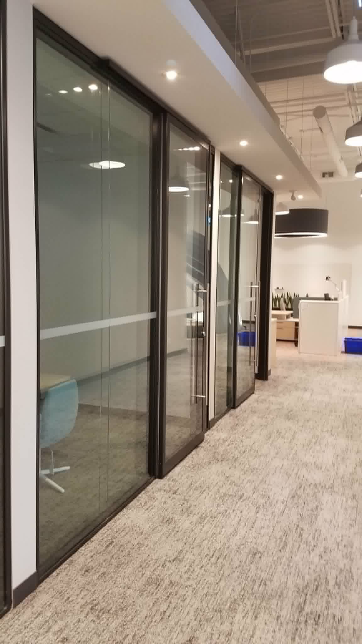 Row of glass-front offices installed by SOIS in a Toronto commercial building